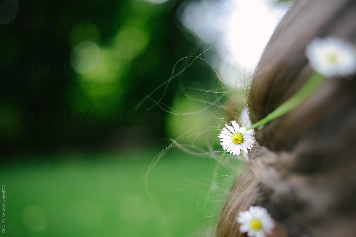 Girl with daisies in her hair