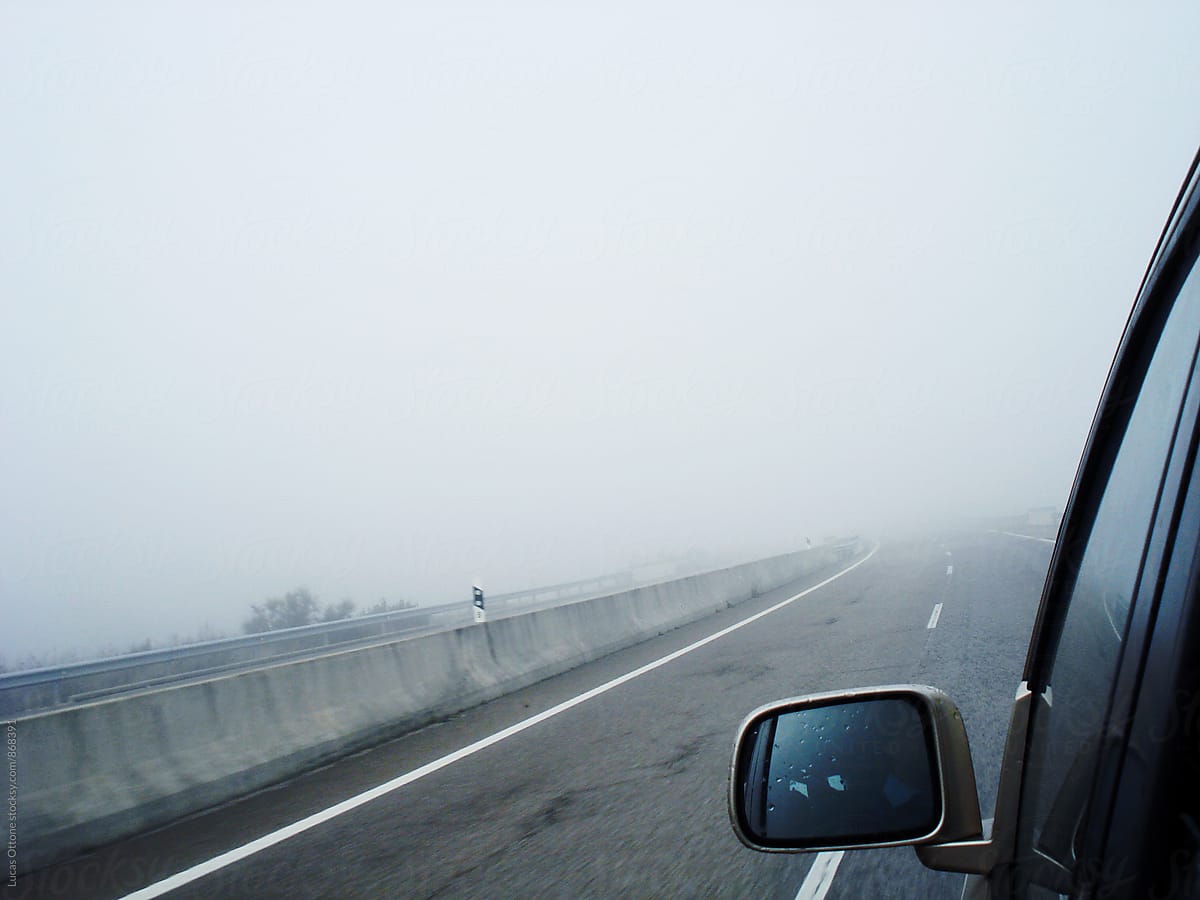 Fog covering an empty road