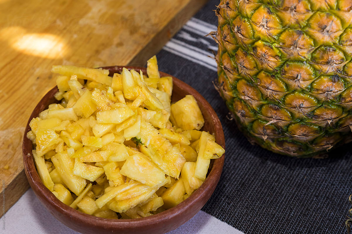 pineapple pieces in a clay container