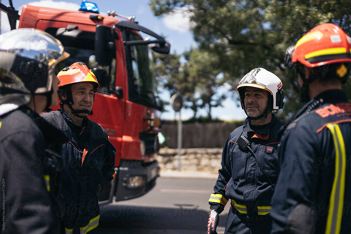 Firefighters working in an emergency on the street