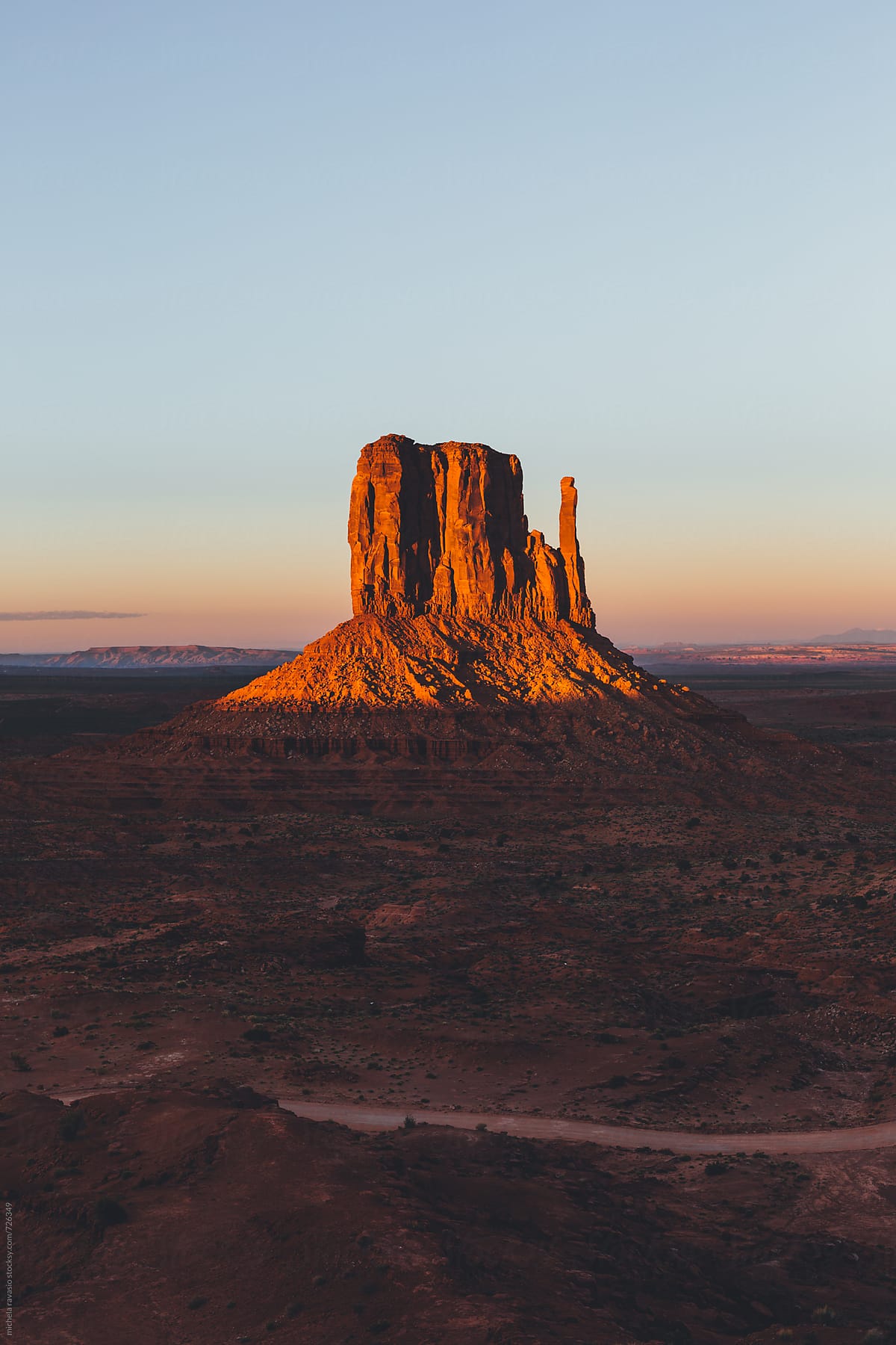 View of West Mitten in Monument Valley at sunset