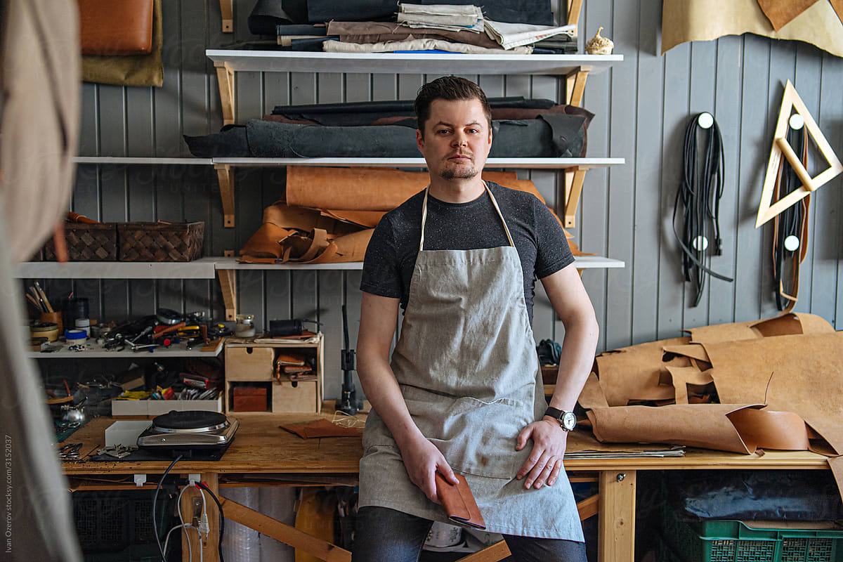portrait of a master in his leather workshop