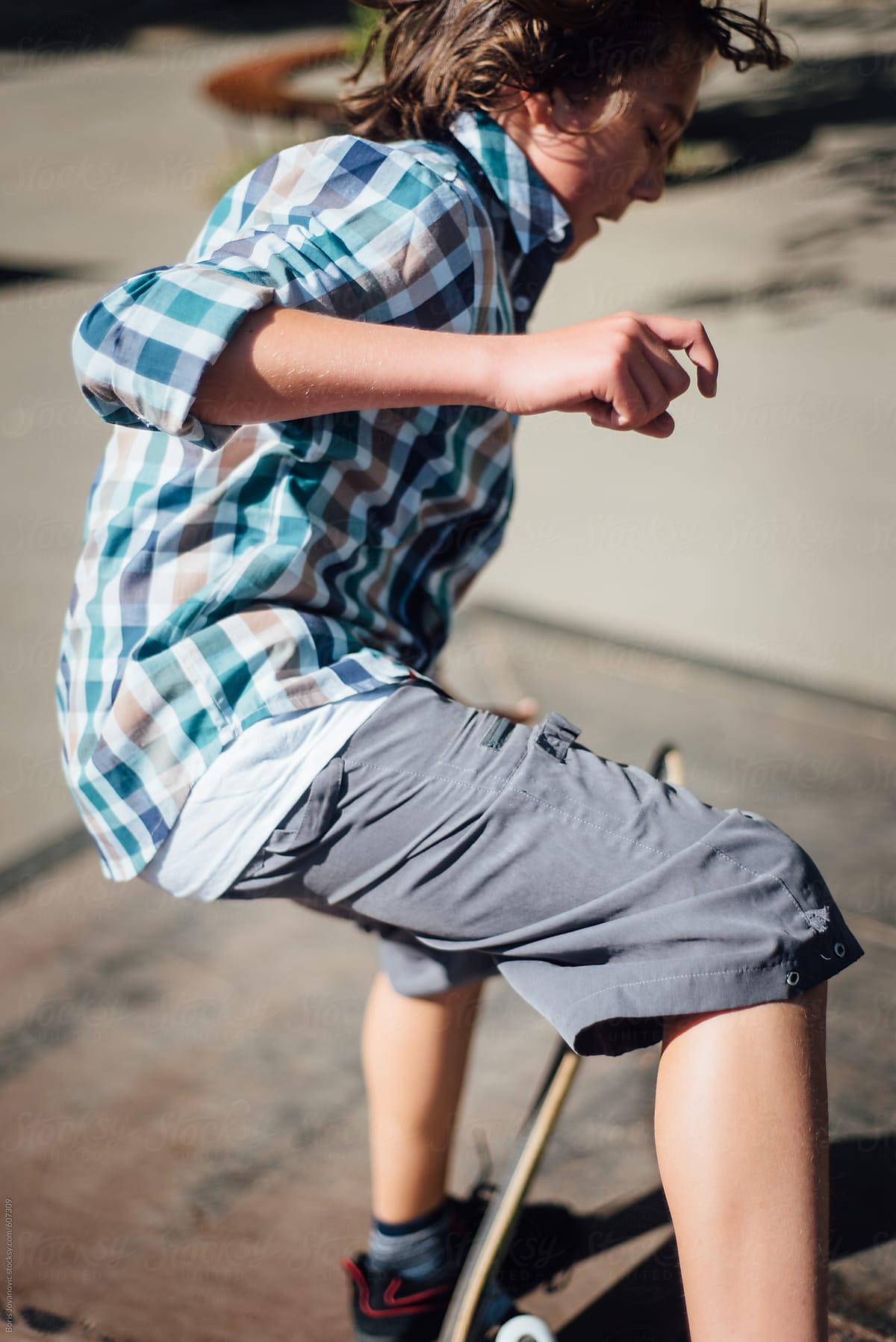 Young Boy Riding A Skateboard By Boris Jovanovic 8854