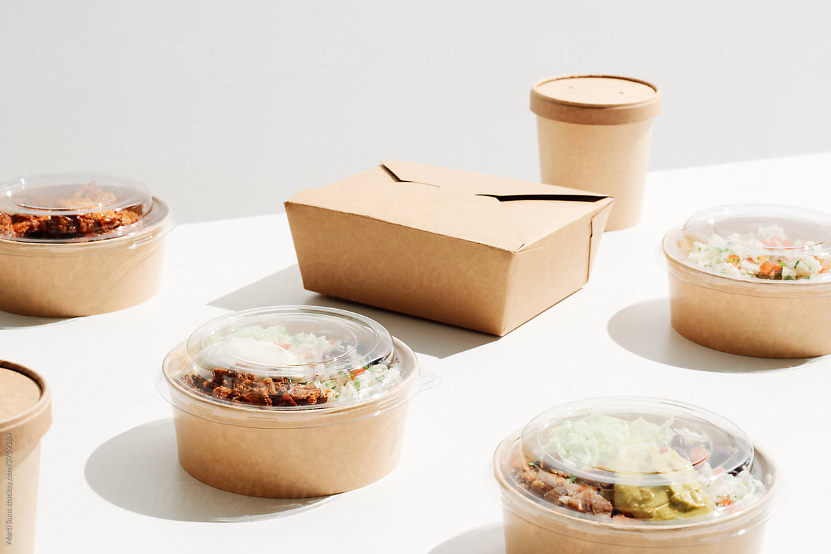Variety of carton takeaway containers with food