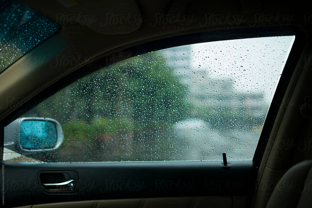 Raindrops Beading On Glass Of Car Window On Wet Misty Day, View From Inside  The Car by Lawren Lu