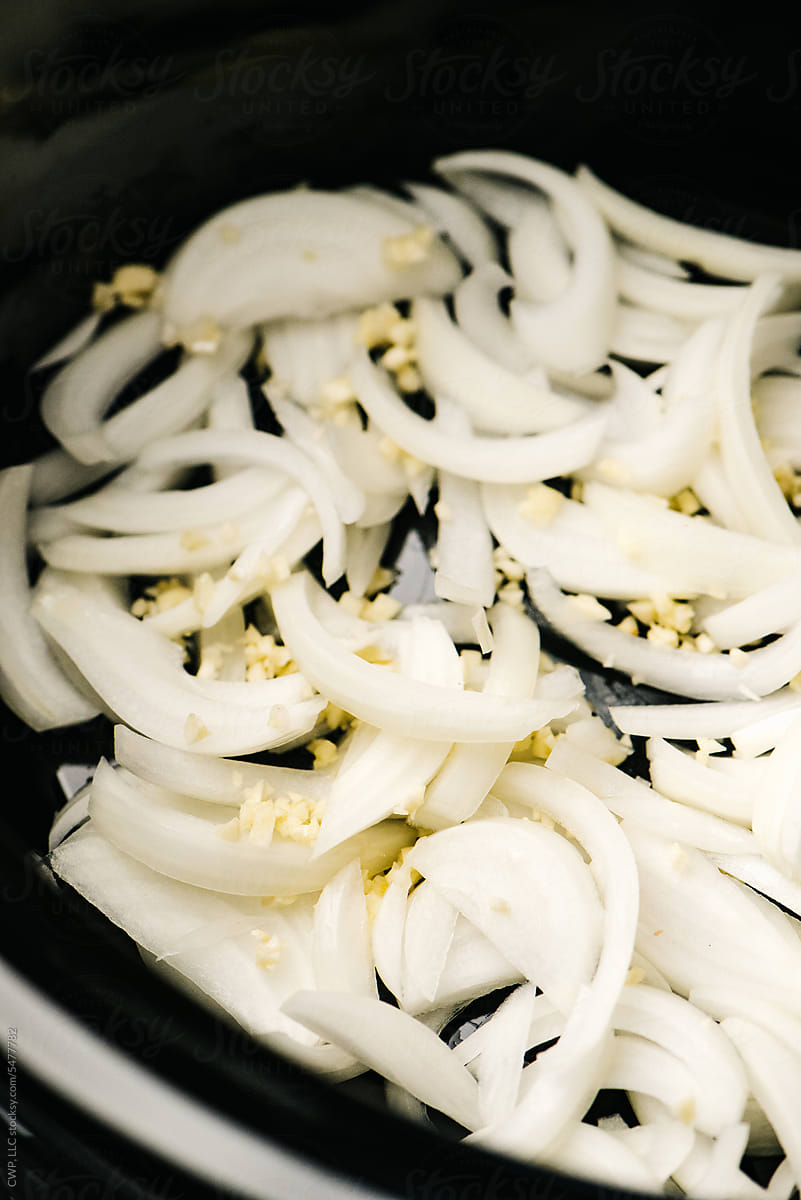 Sliced onions in the crockpot