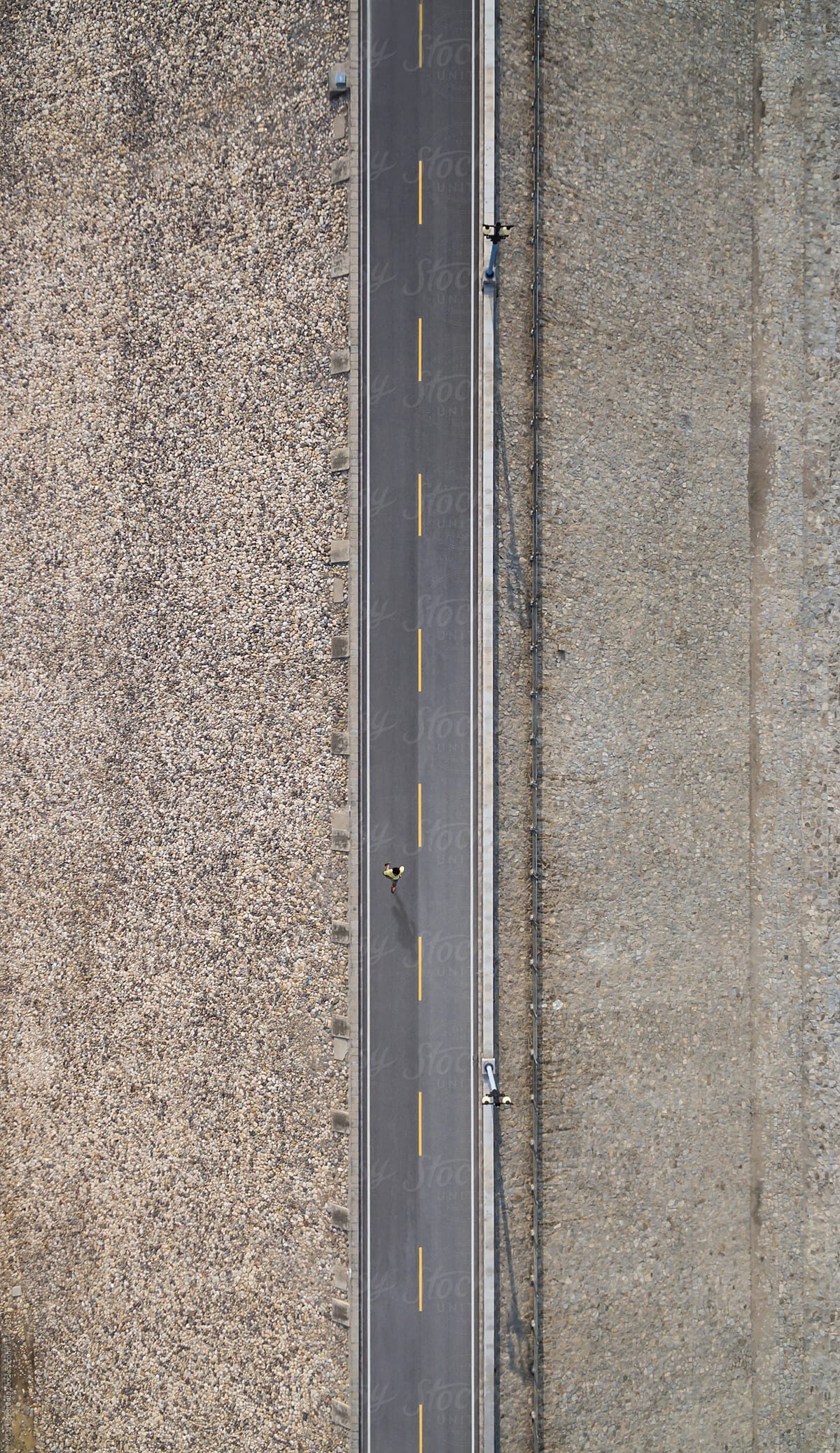 Aerial view of man running on road