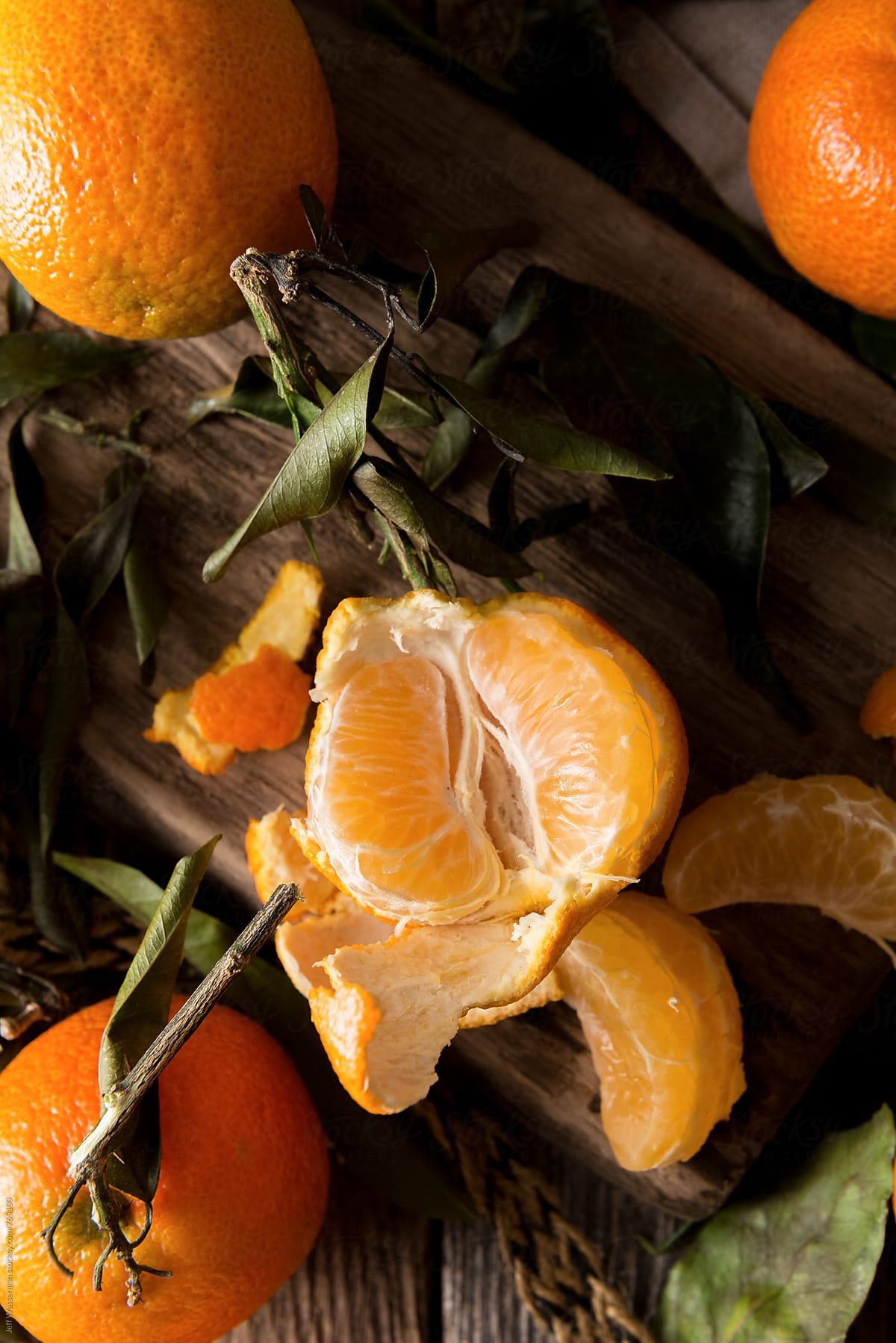 Mandarin Oranges Torn Open in Still Life