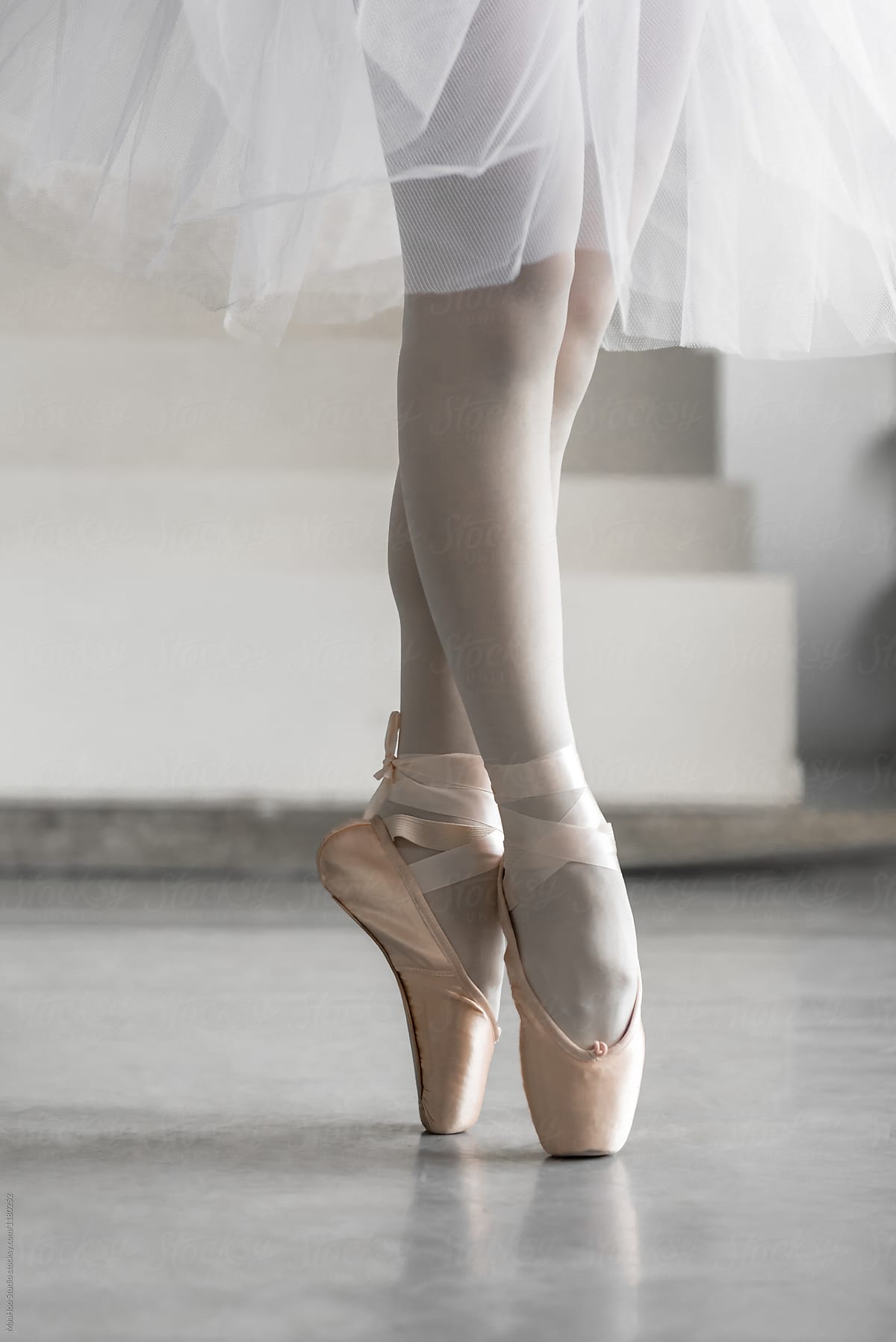 Young professional female dancer practicing in a studio
