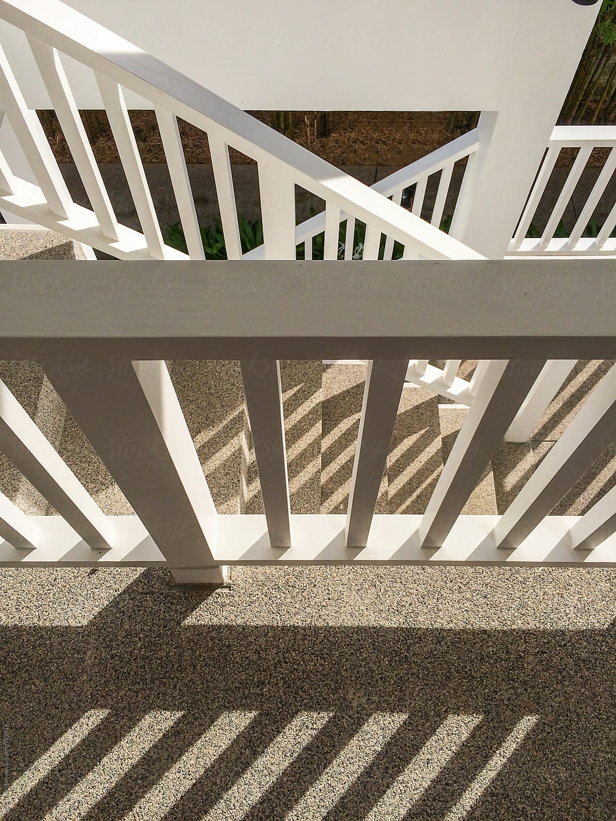 Vertical view of a staircase and railings