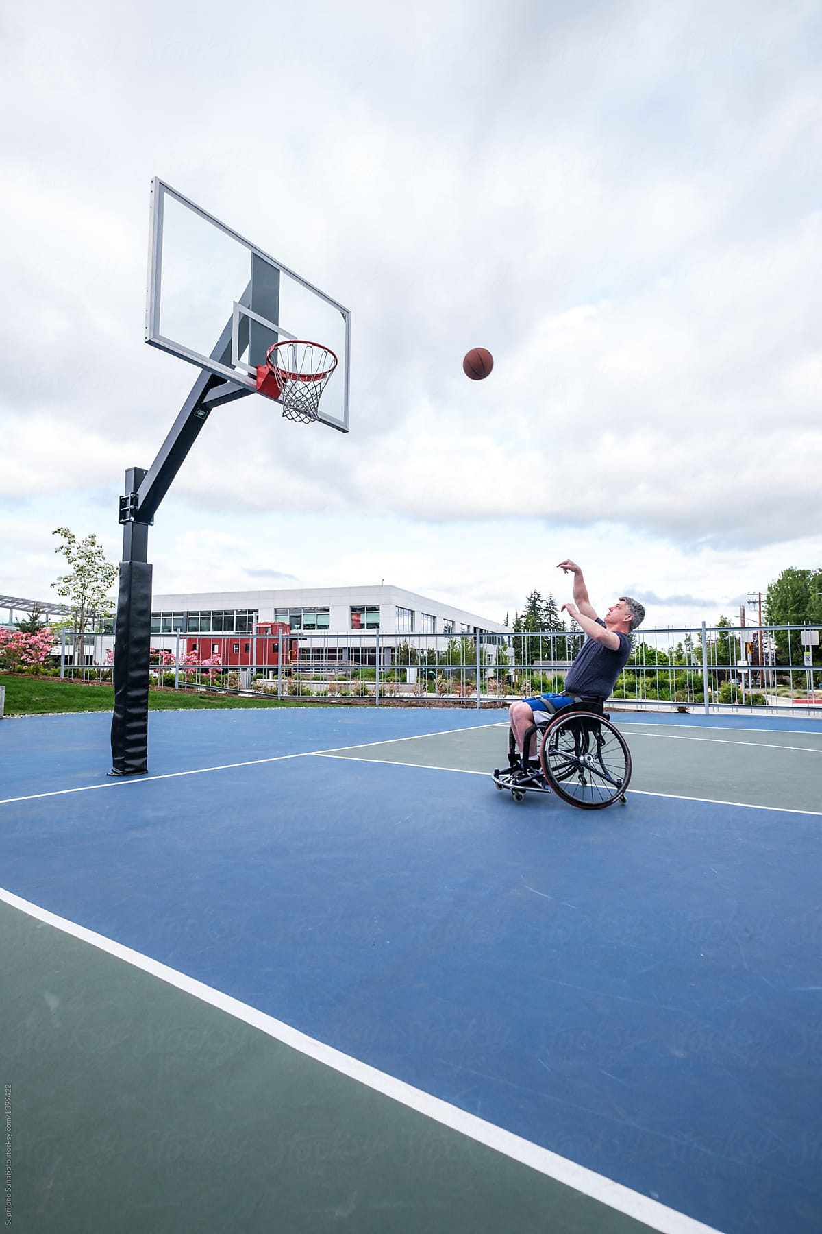 Active Disabled Athlete Practicing Wheelchair Basketball