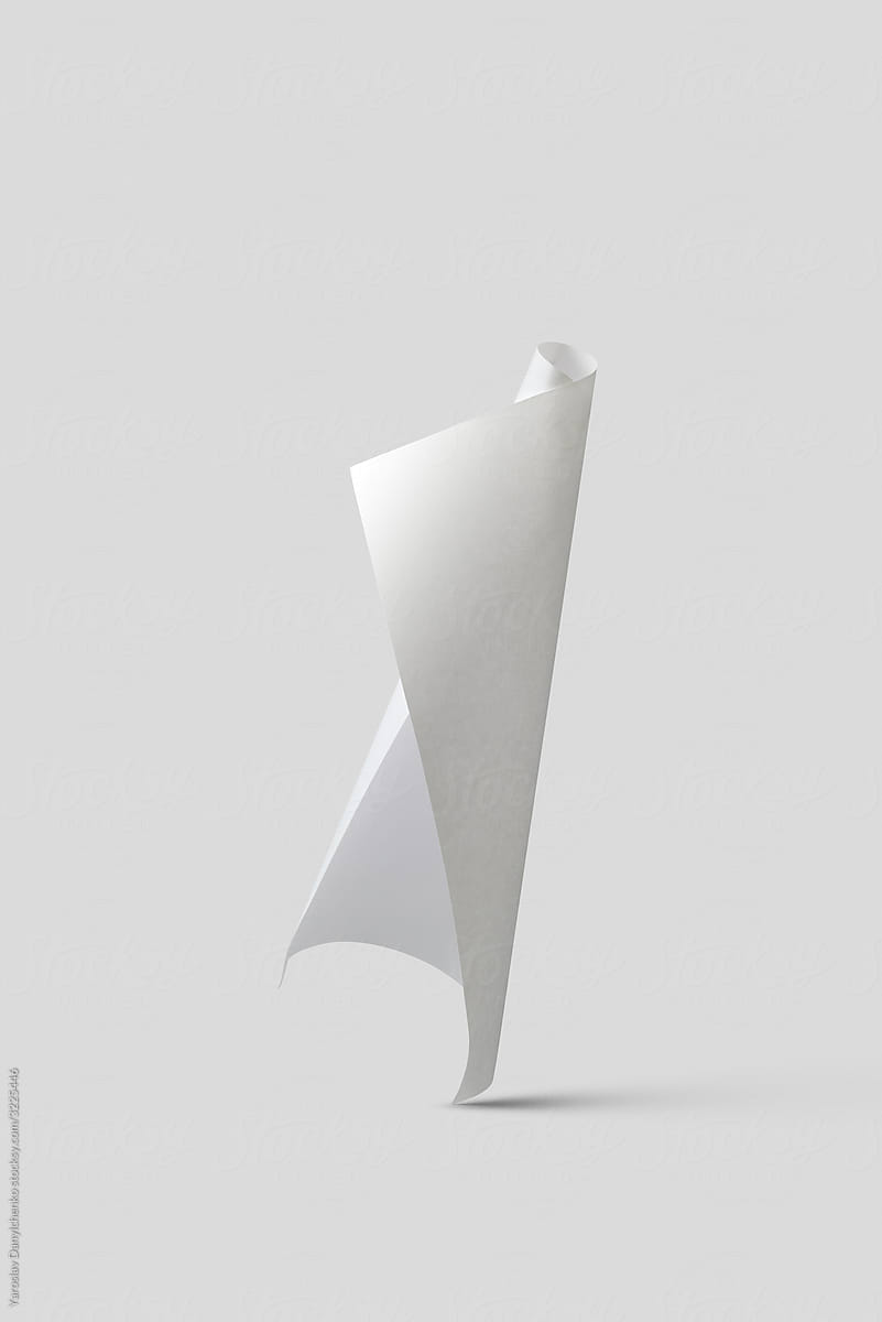 Curved paper sheet vertical falling .