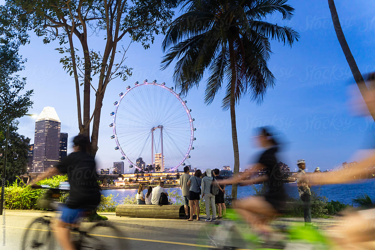 People In At Waterfront Of Singapore At Evening