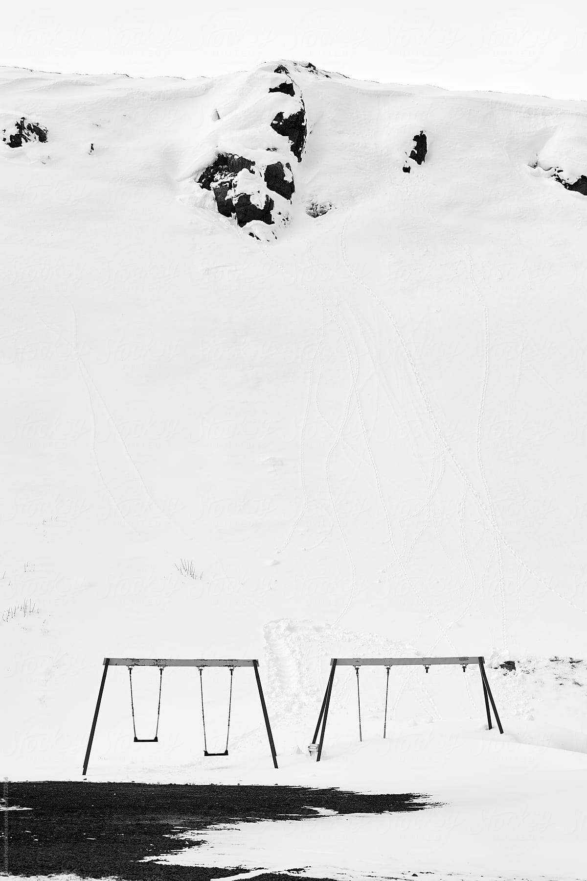 Empty playground in snow