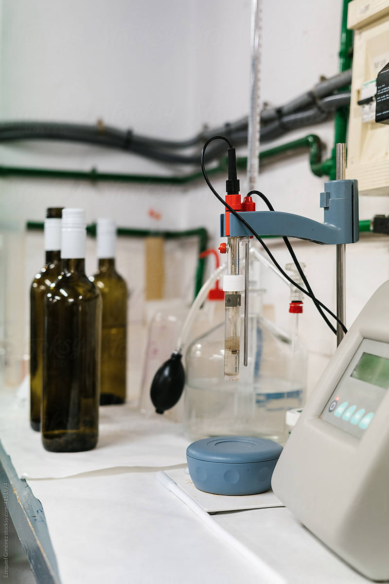 Lab equipment and bottles of wine