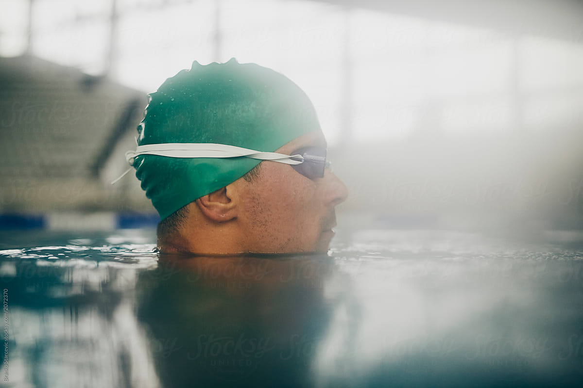 Female athlete preparing for swim.