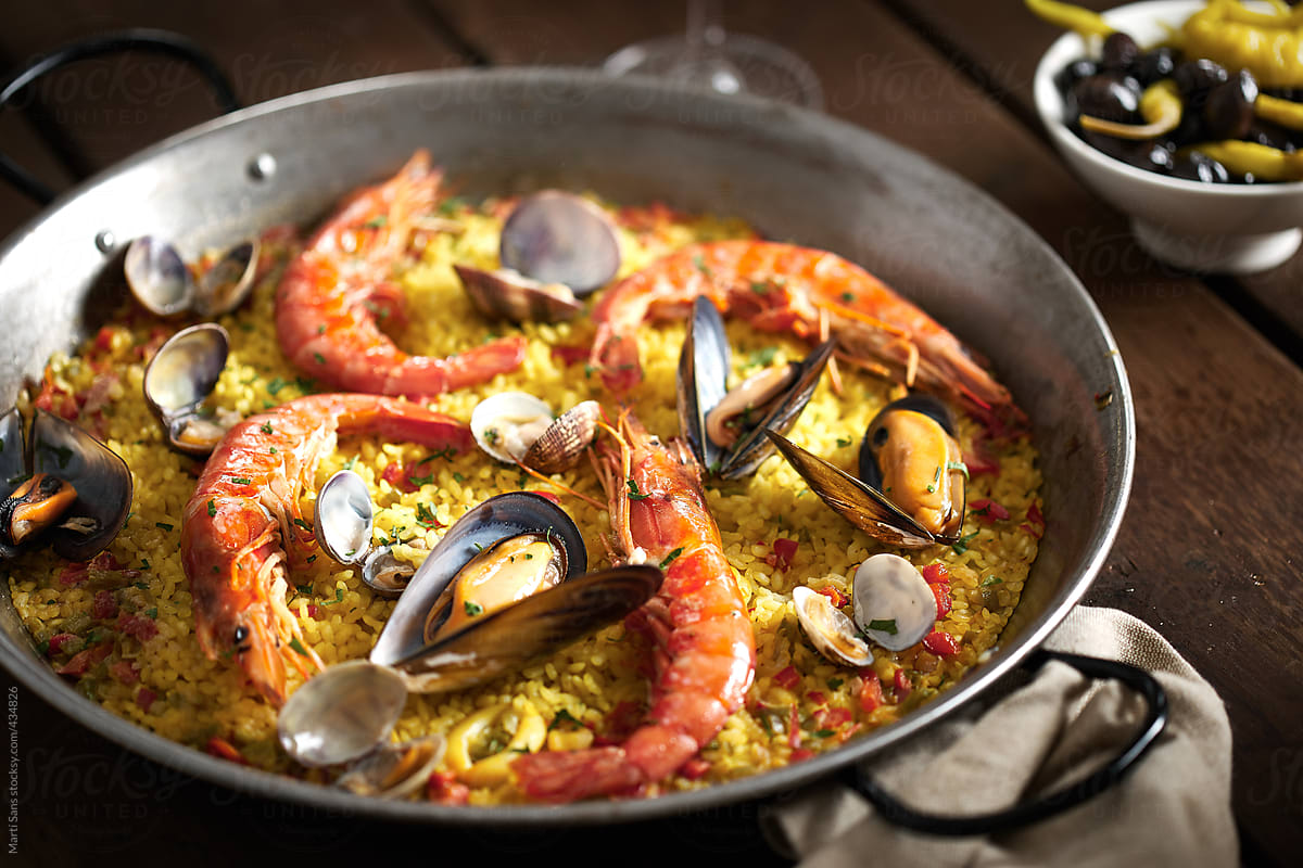 Spanish paella meal and olives
