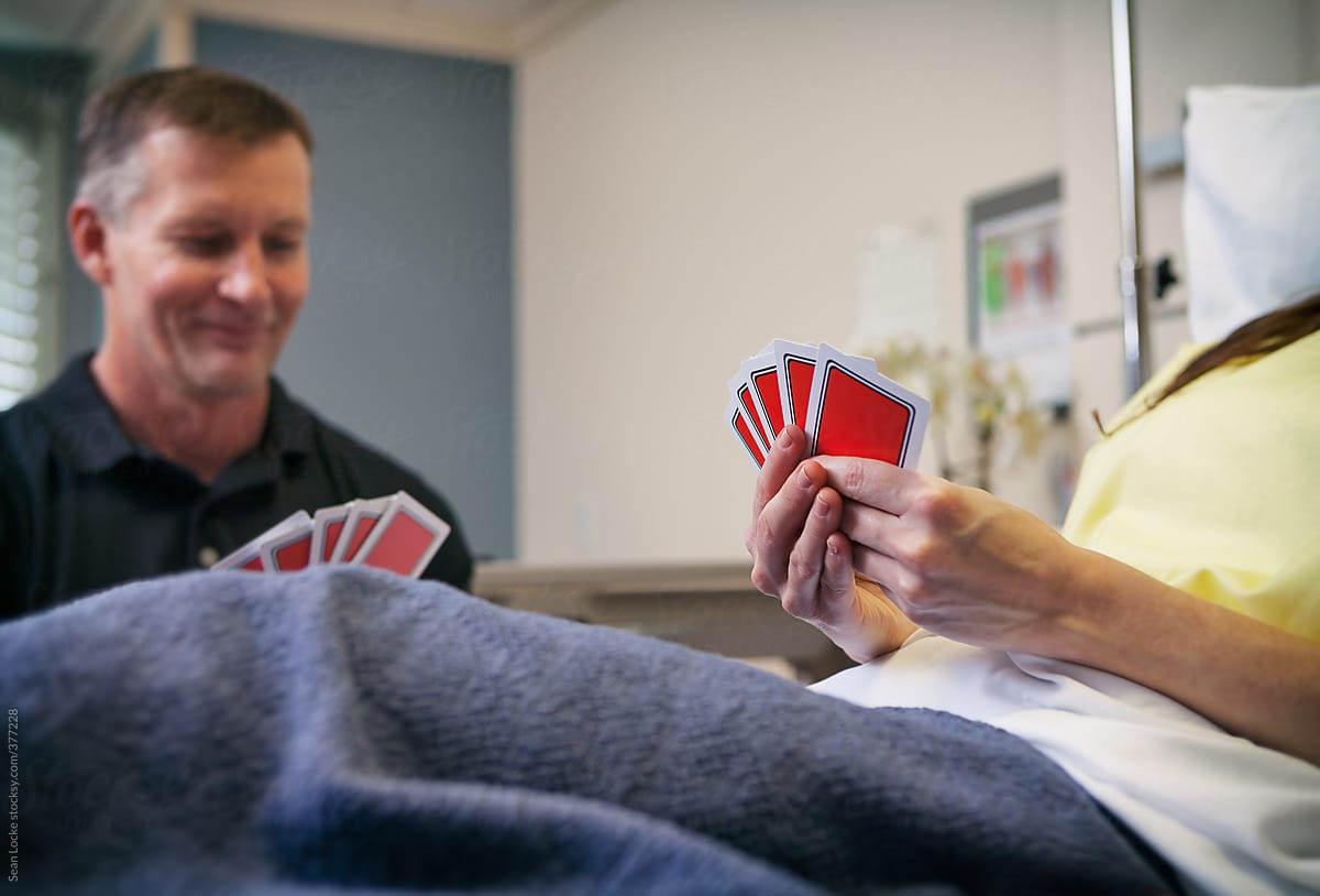 Hospital: Female Patient Playing Cards With Friend