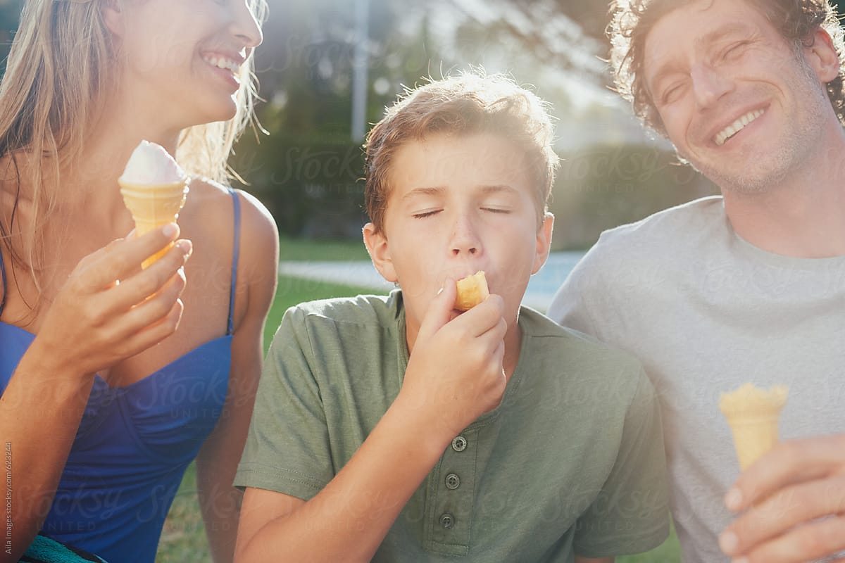 family fun bonding eating ice ream in summer