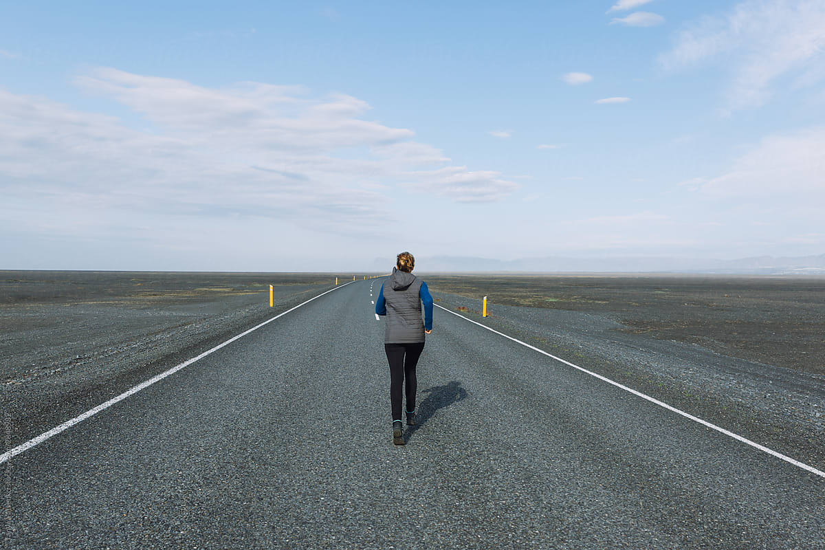 Woman on road 1 in Iceland