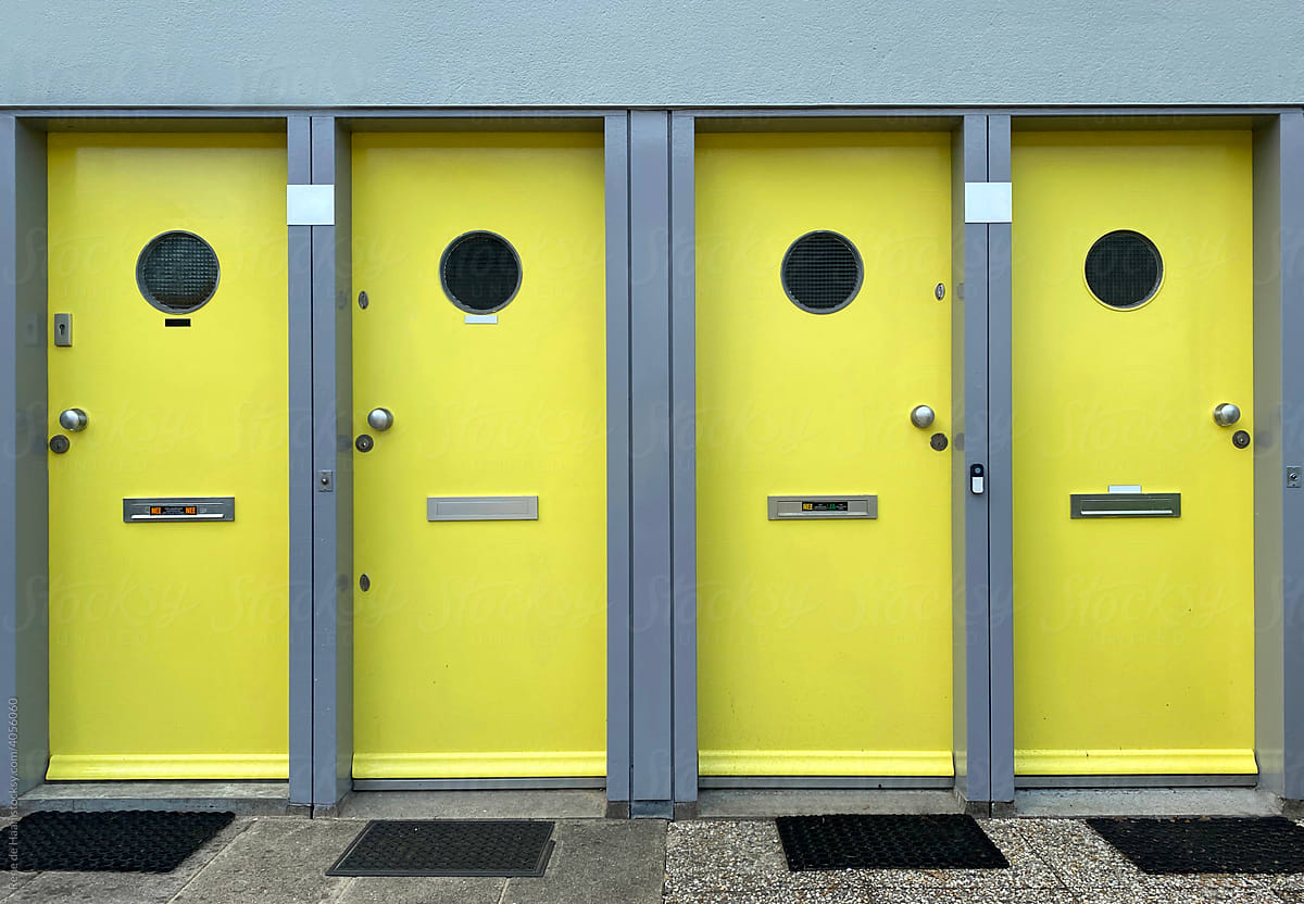 row of 4 yellow doors