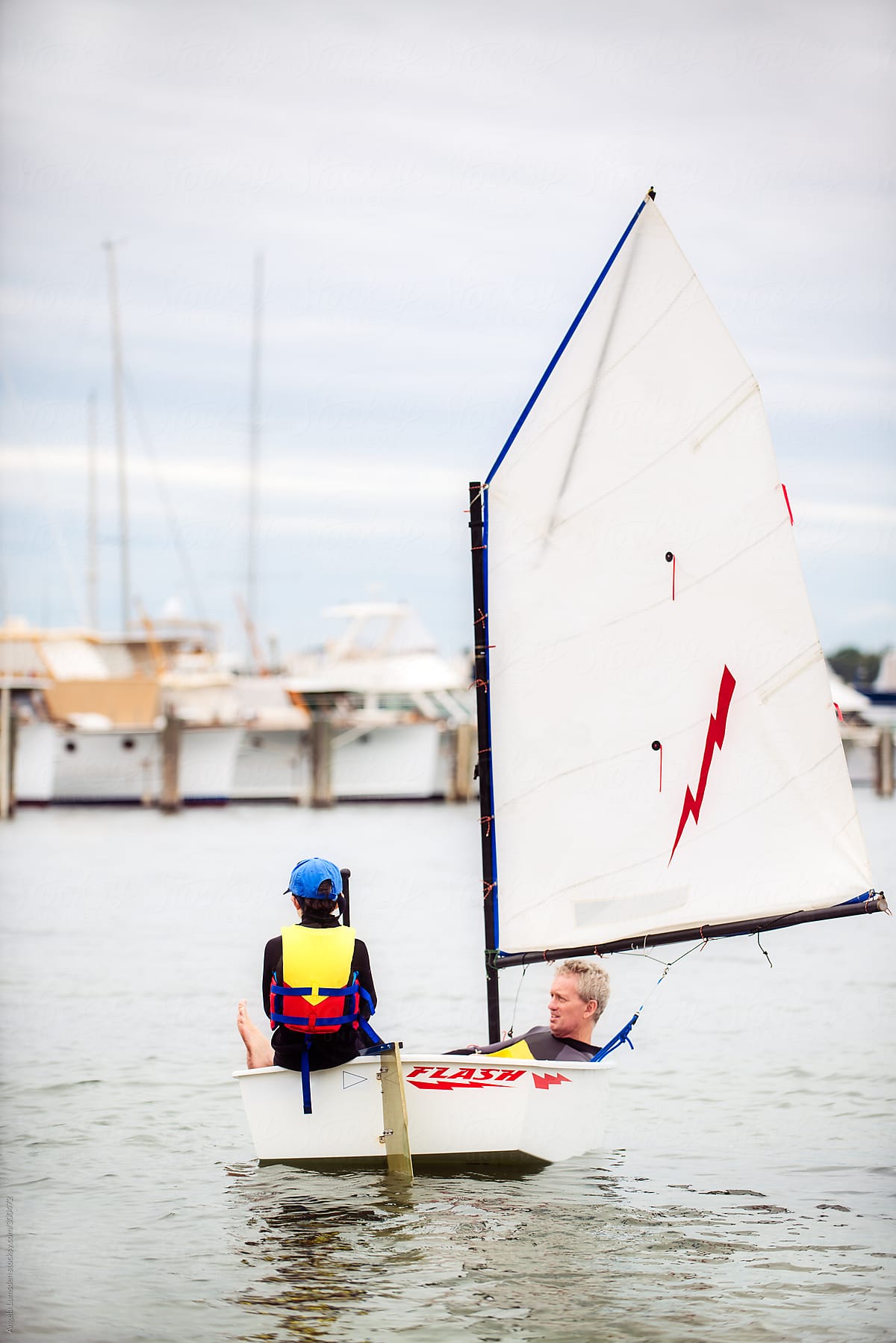 Boy takes his father for an uncomfortable ride in his sail boat