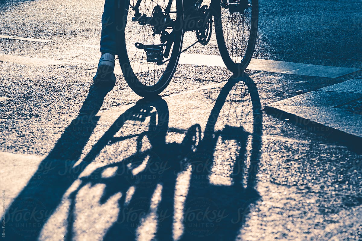 Bike and shadow on traffic stop line