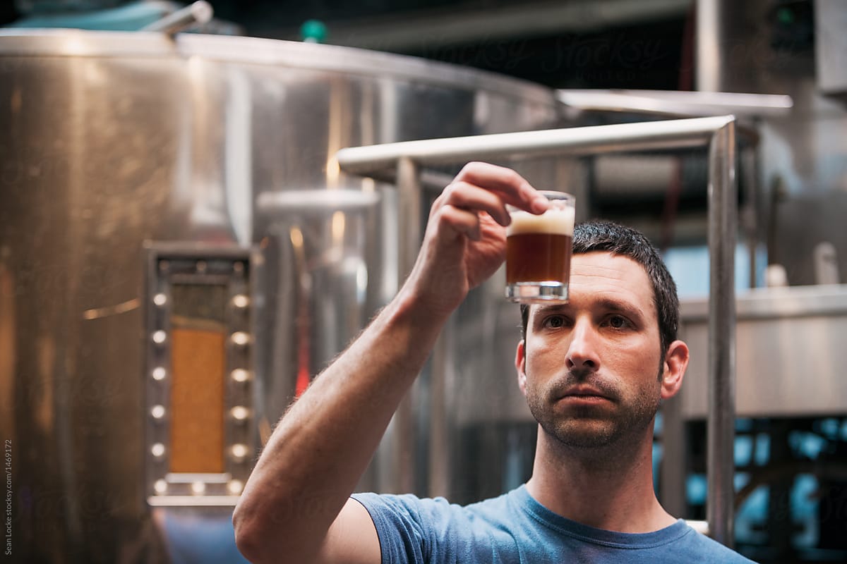 Beer: Brewer Checks Color On Chocolate Stout Beer