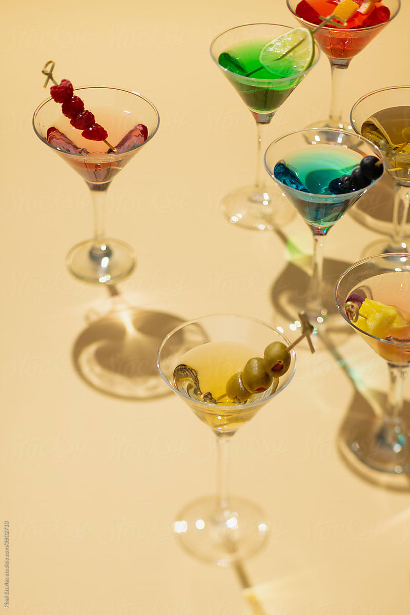Various colorful martini cocktail drink glasses