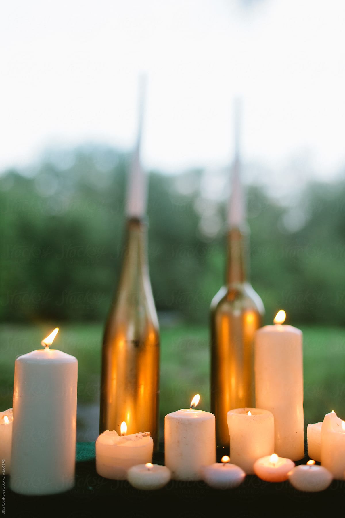 Tilt-shift photo of assorted burning candles