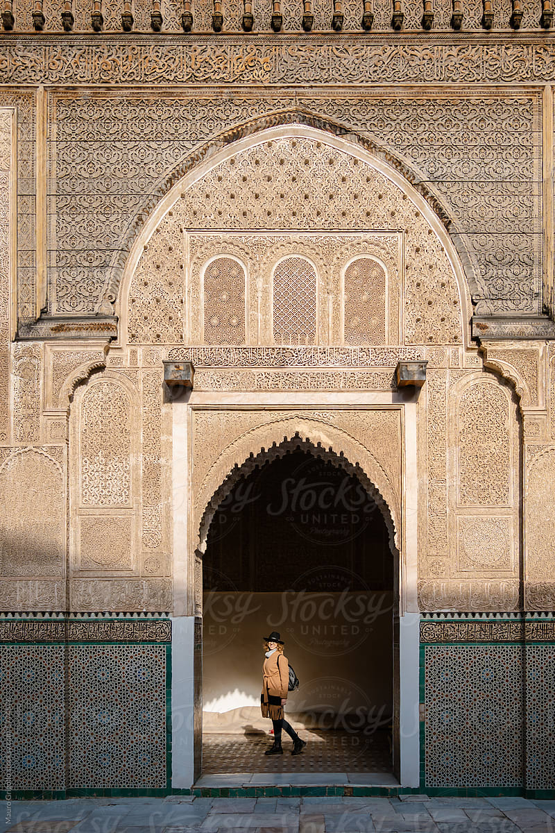 A woman visiting a Moroccan-style palace
