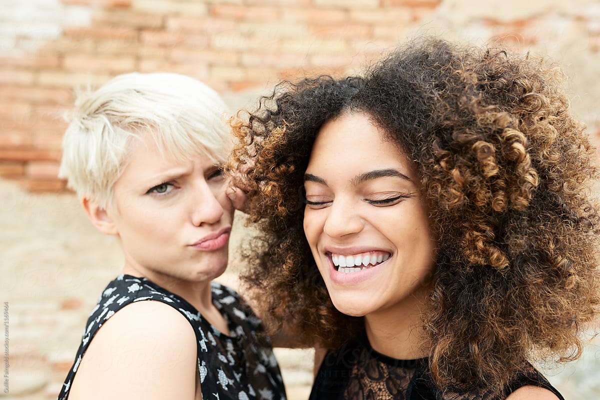 Two Cute Girlfriends Close Up By Stocksy Contributor Guille