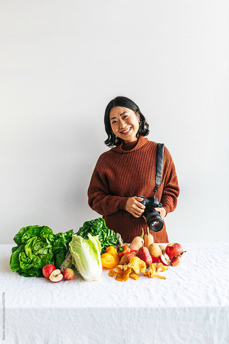 Photographer with fresh produce