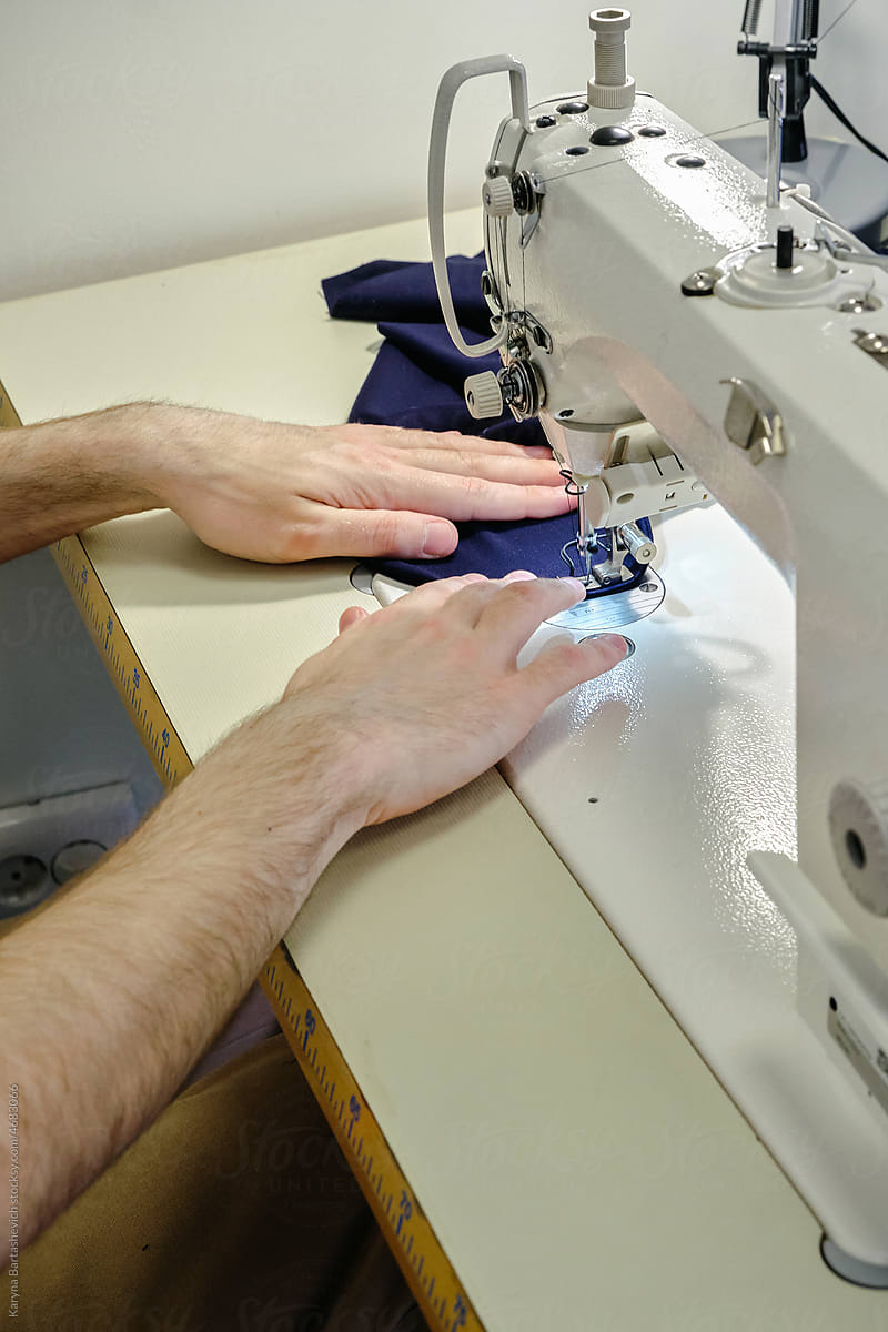 Tailor at work in a sewing studio