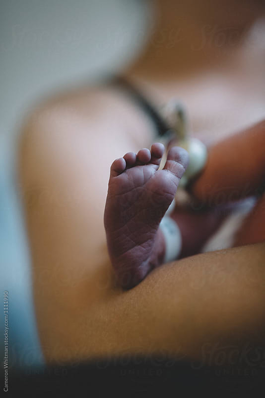 Newborn infants purple foot