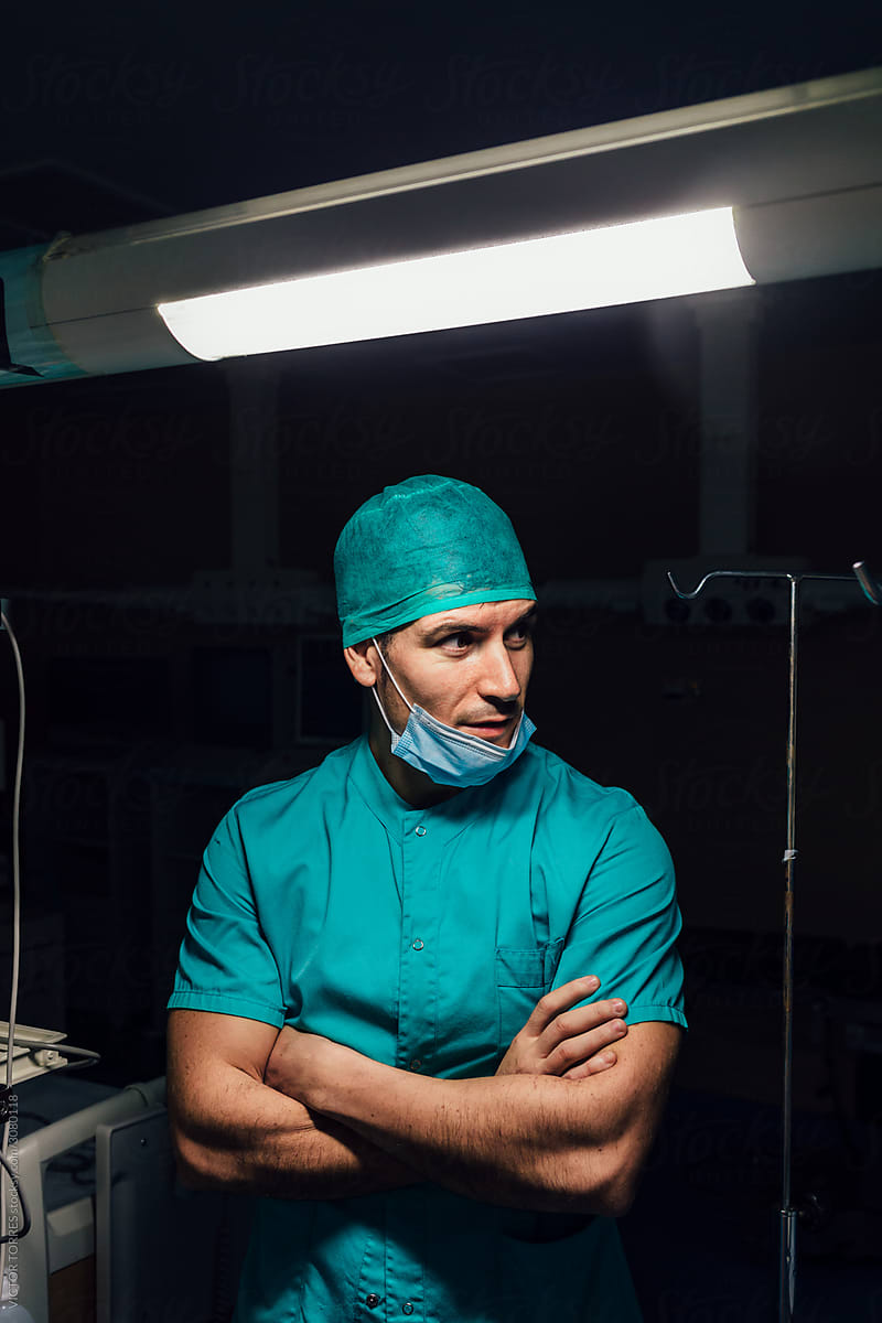 Portrait of confident happy surgeon