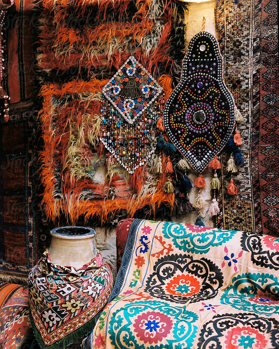 beautiful ethnic corner in the Turkish style. Multicolored carpets with patterns. bead jewelery