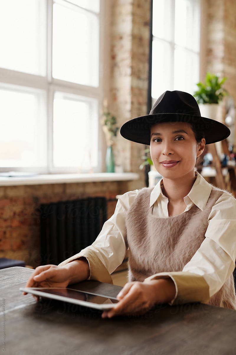 Attractive office woman in black hat