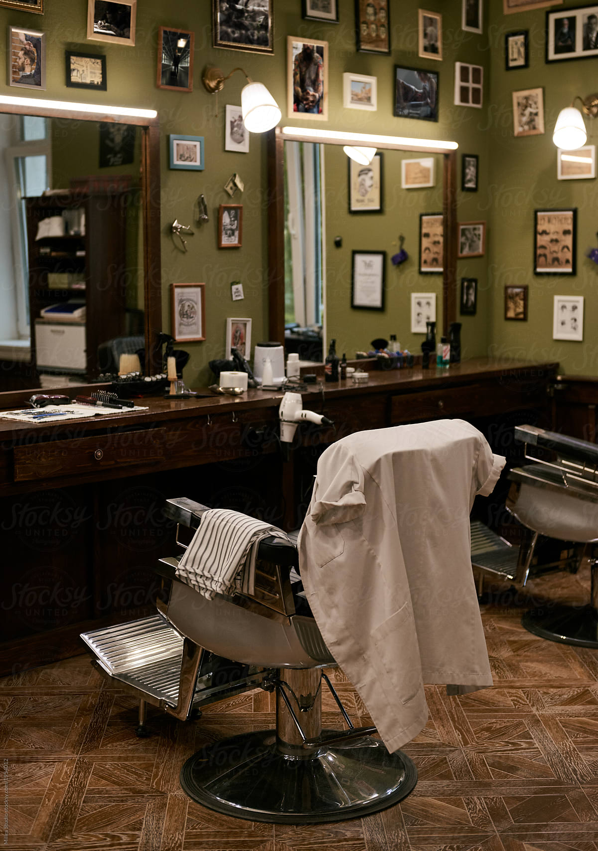 Chair of stylish barbershop in interior