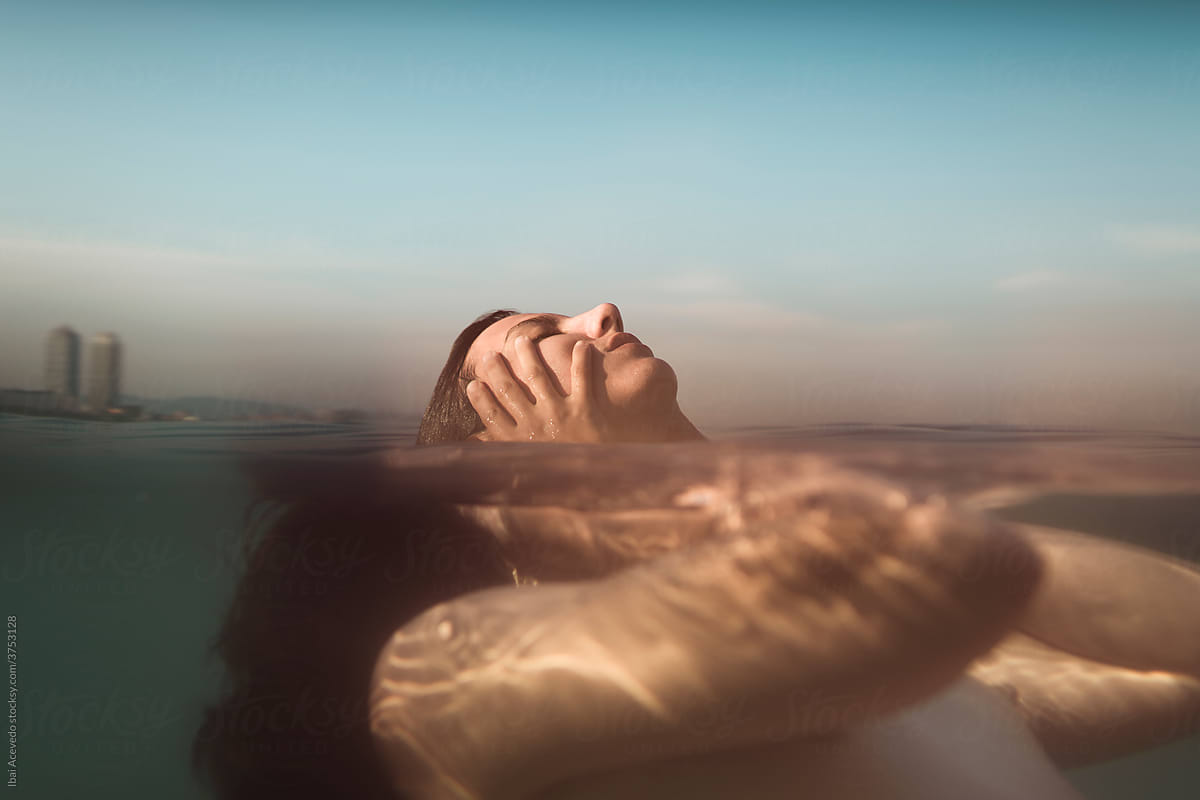 Underwater portrait of floating woman