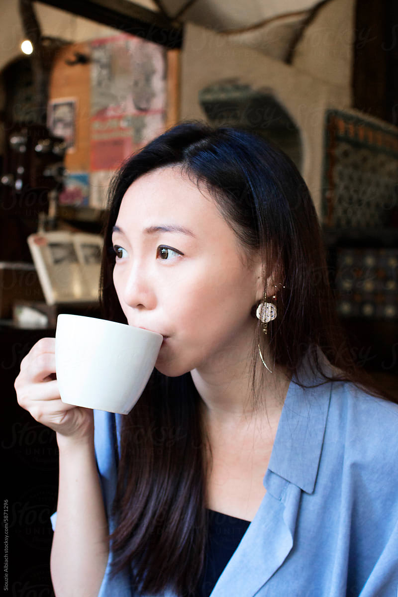 Asian girl in a Japanese coffee shop
