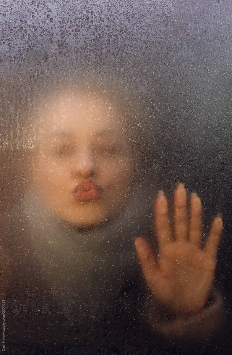 Young Woman Touching And Kissing Wet Glass By Stocksy Contributor 