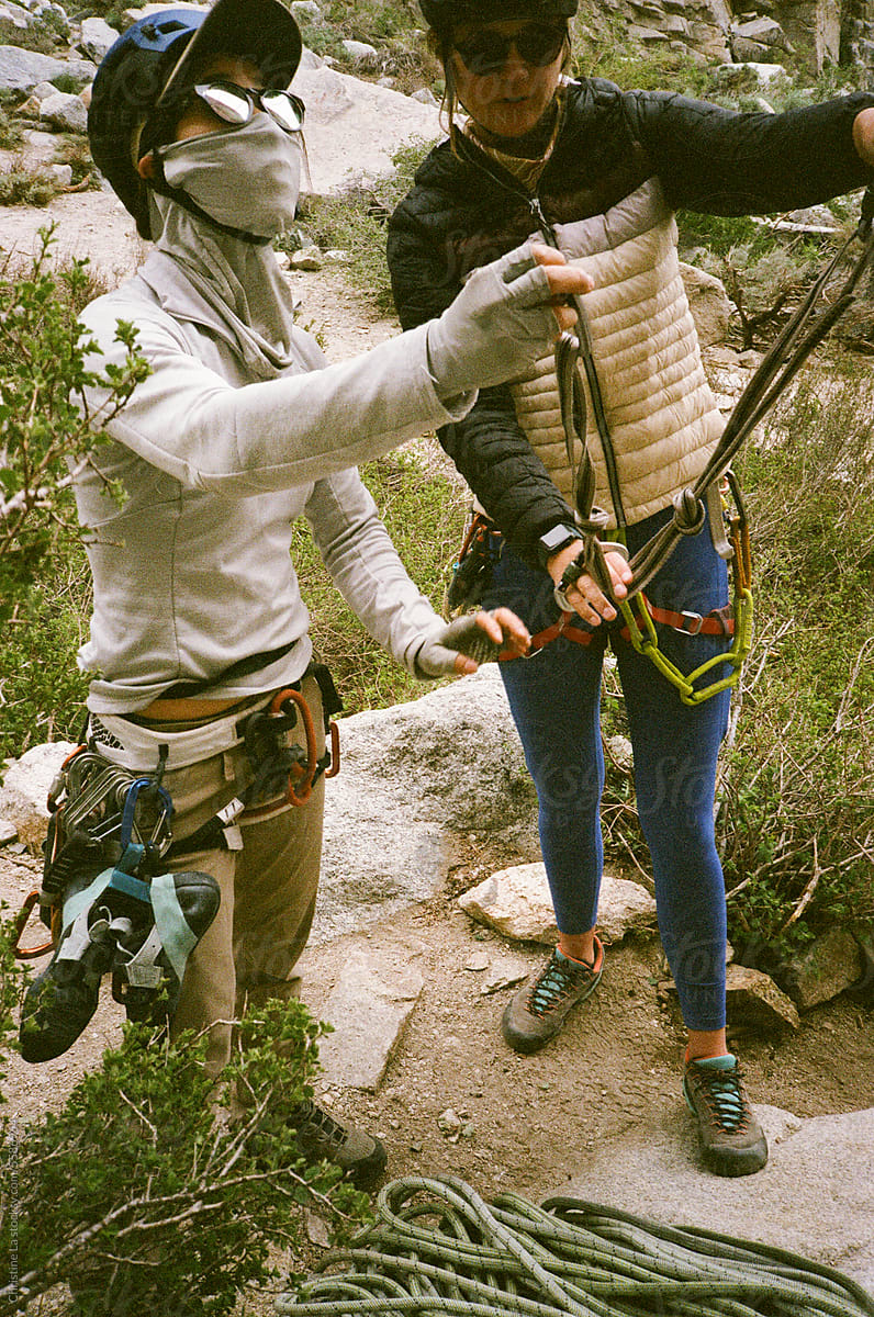 Women outdoor climbing preparation