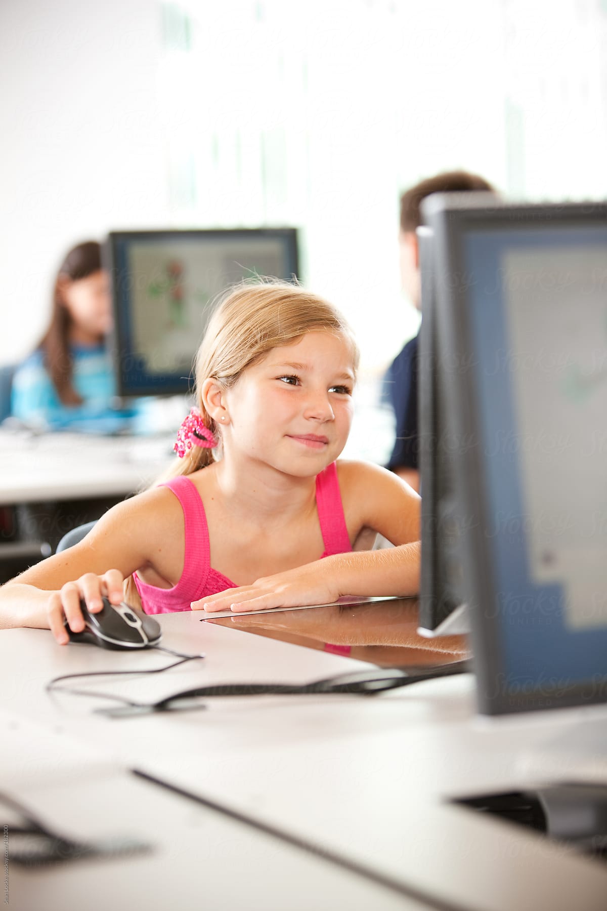 Computer Class: Girl Using Mouse at Workstation