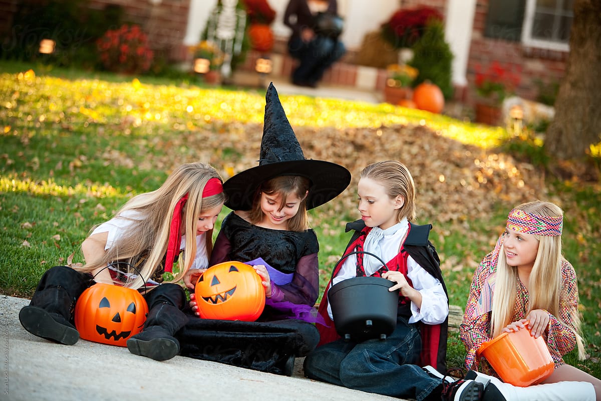 Halloween: Children Look at the Candy They Received