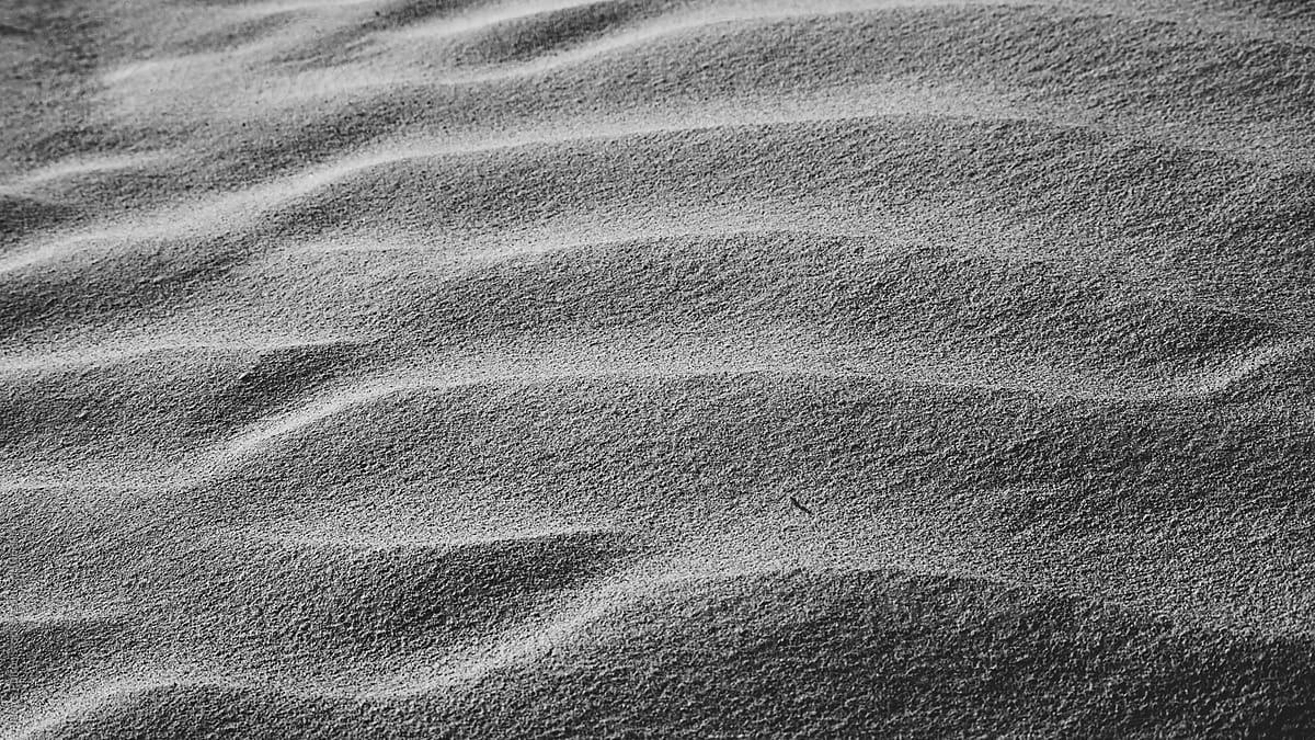 desert and sand ripples in black and white.