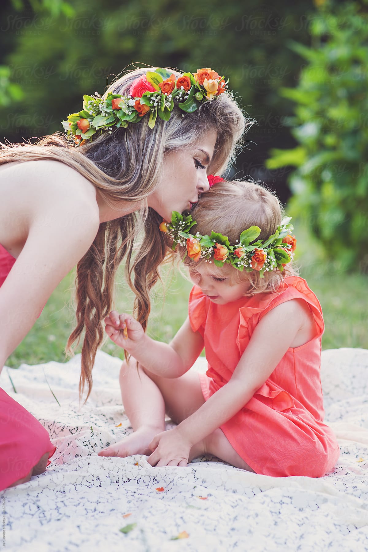View Beautiful Mother Kissing Her Lovely Daughters Head Both Wearing