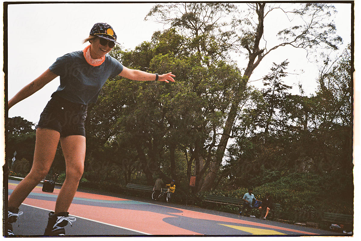35mm Film: Woman in shorts rollerblading