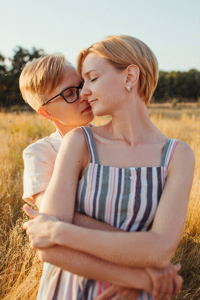 Lesbian Couple Two Pretty Blond Women Hugging With Closed Eyes By