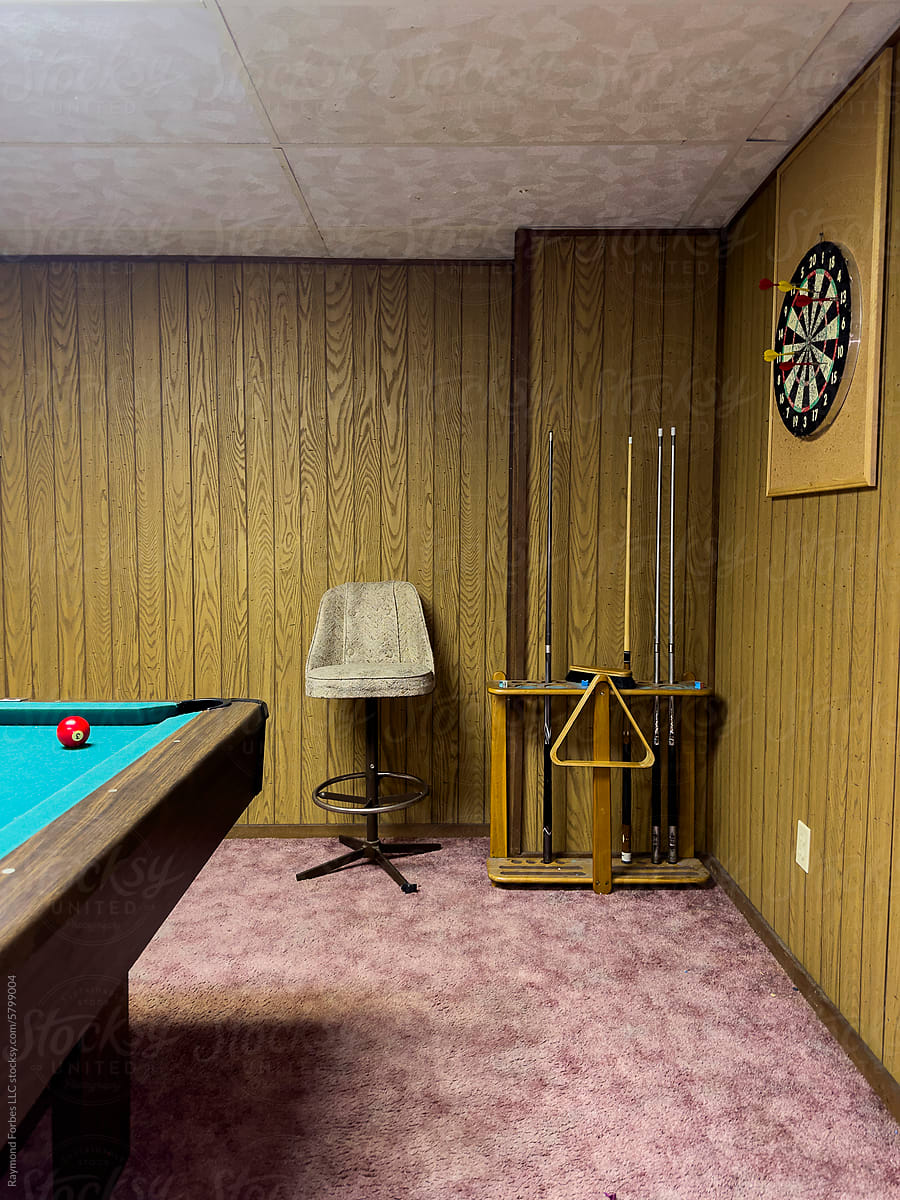 Vintage Billiard Table from seventies with wood paneling with chair
